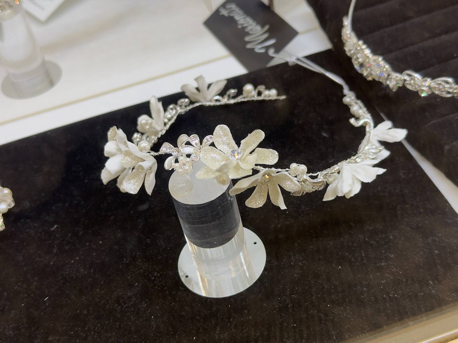 Bridal headpiece of white flowers and pearls