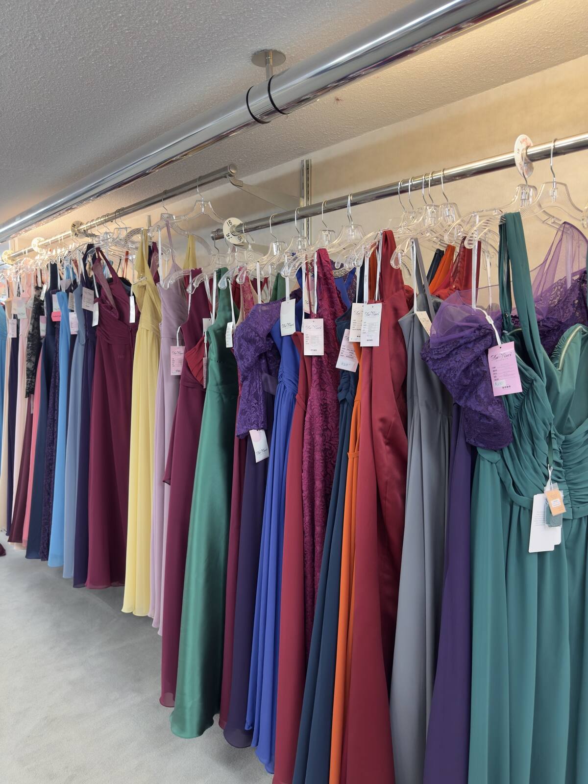 Bridesmaid dresses in jewel tones on the rack