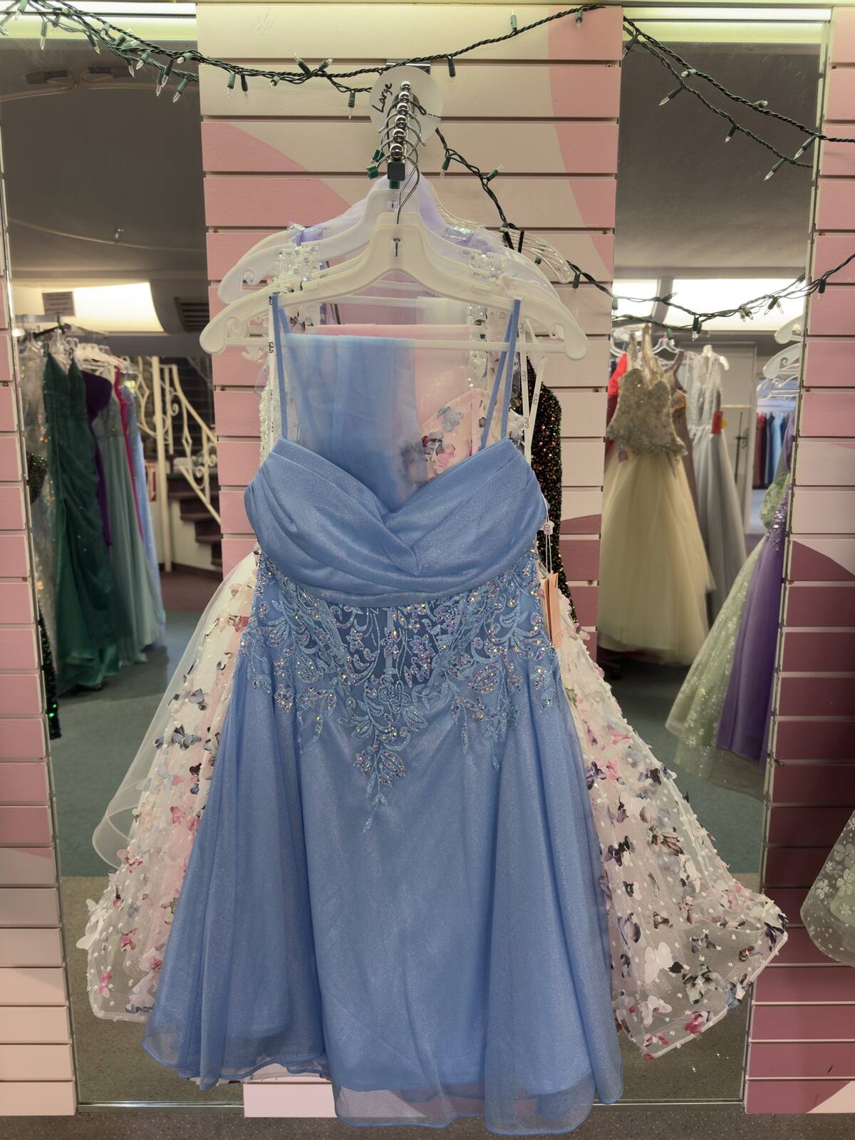 Short periwinkle homecoming dress with a beaded bodice