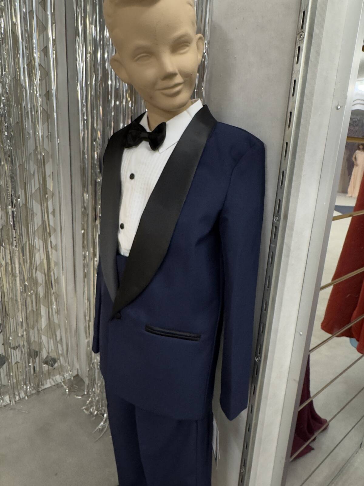 Boys' navy tuxedo with black satin lapels